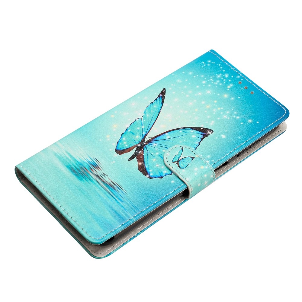 Egyedi könyvtáska Samsung Galaxy A06 4G - kék pillangóhoz