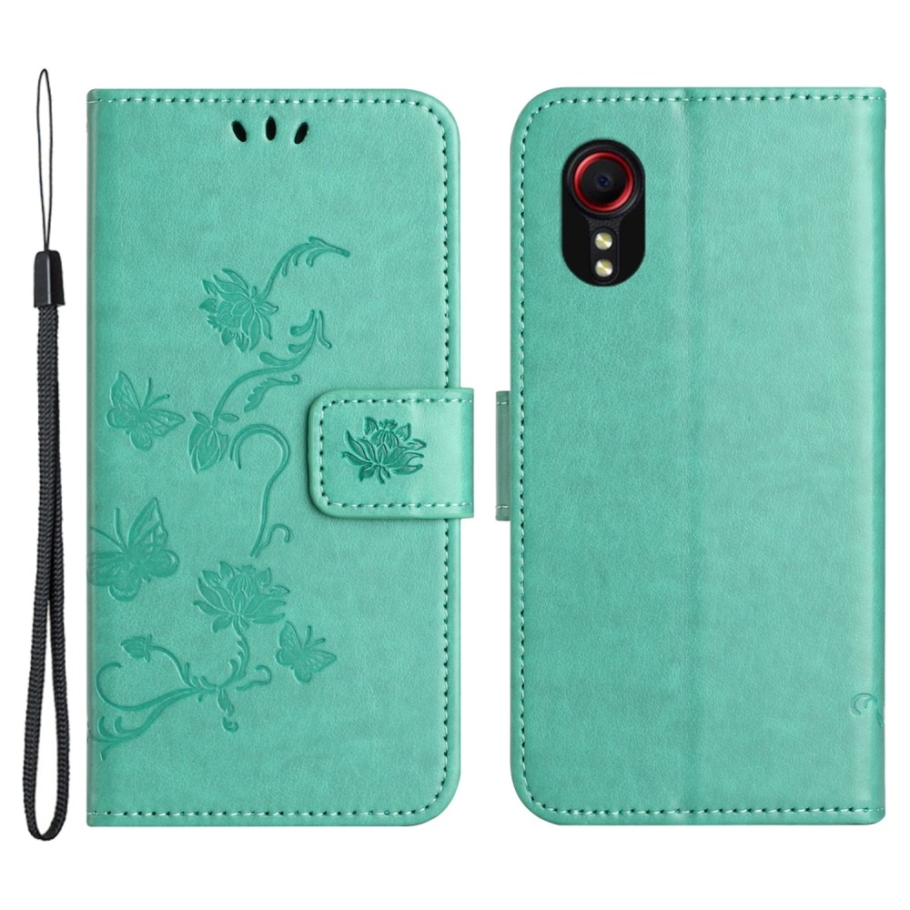 Virágos könyvtáska Samsung Galaxy Xcover 7 készülékhez - teal színű