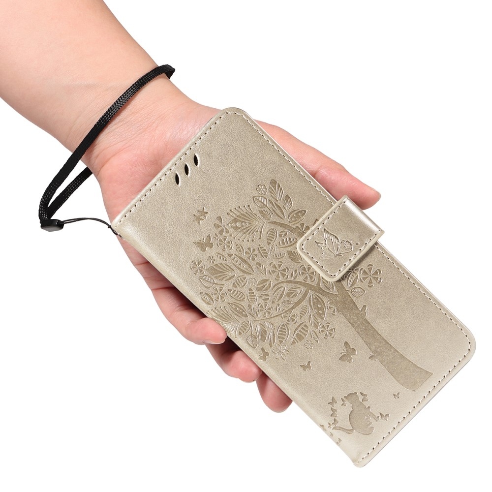 Fák könyv tok Xiaomi Redmi A5 (173.45x79.35x8.45mm) - arany színű