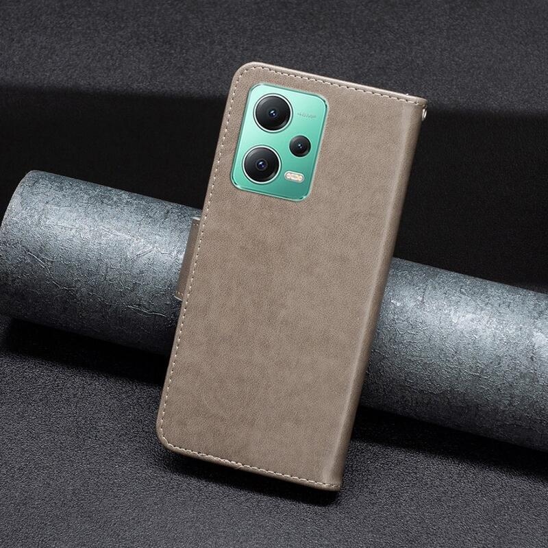 Pillangó könyv tok a Xiaomi Redmi Note 12 5G/Poco X5 5G számára - szürke