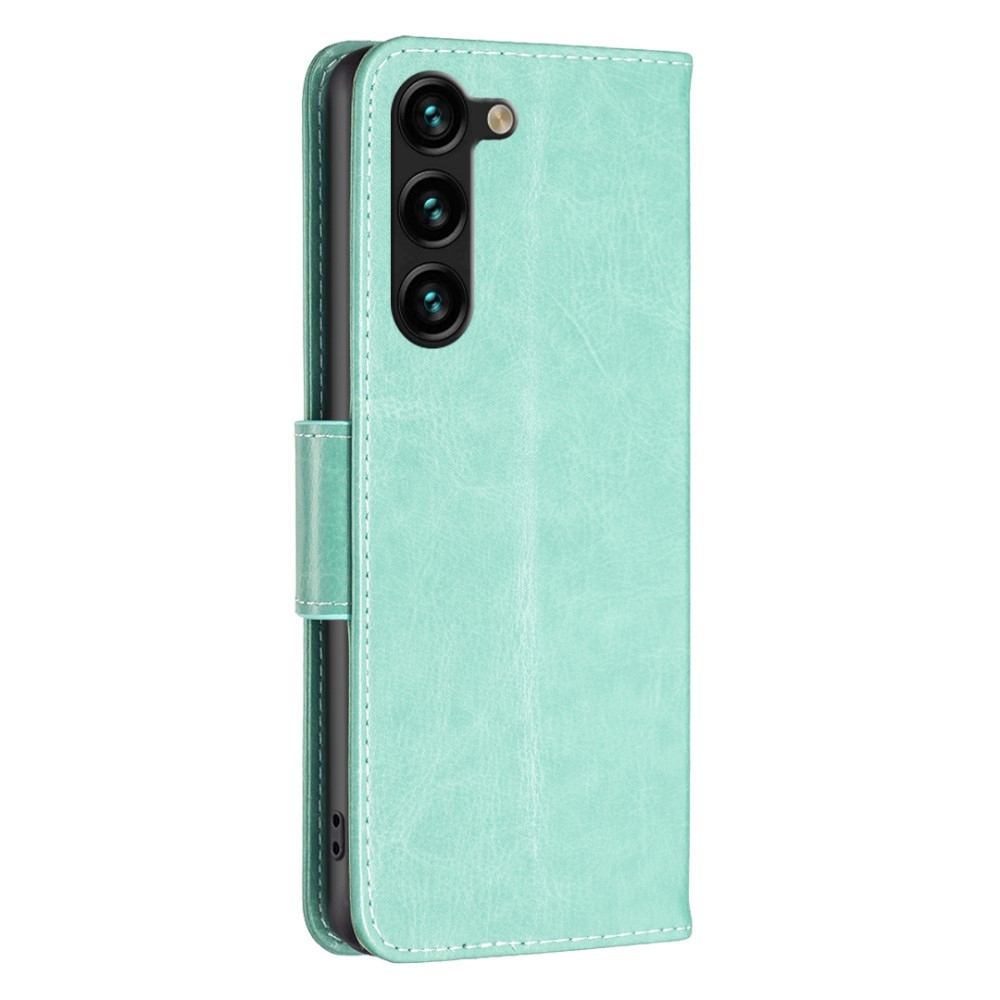 Pillangó könyv tok Samsung Galaxy S24+/S25+ készülékhez - teal színű