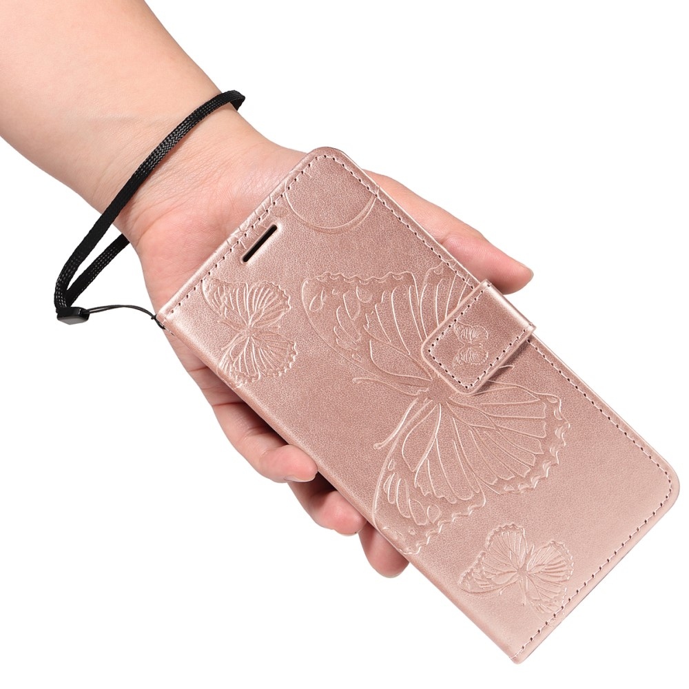 Nagy pillangó könyv tok Xiaomi Redmi A5 (171.7x77.8x8.3mm) - rózsaarany színben