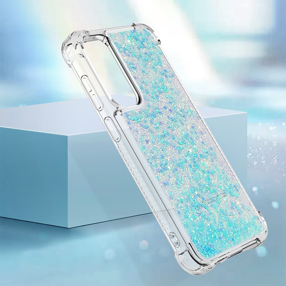 Glitter zselés homokóra hüvely Samsung Galaxy S23 FE készülékhez - kék / csillagok