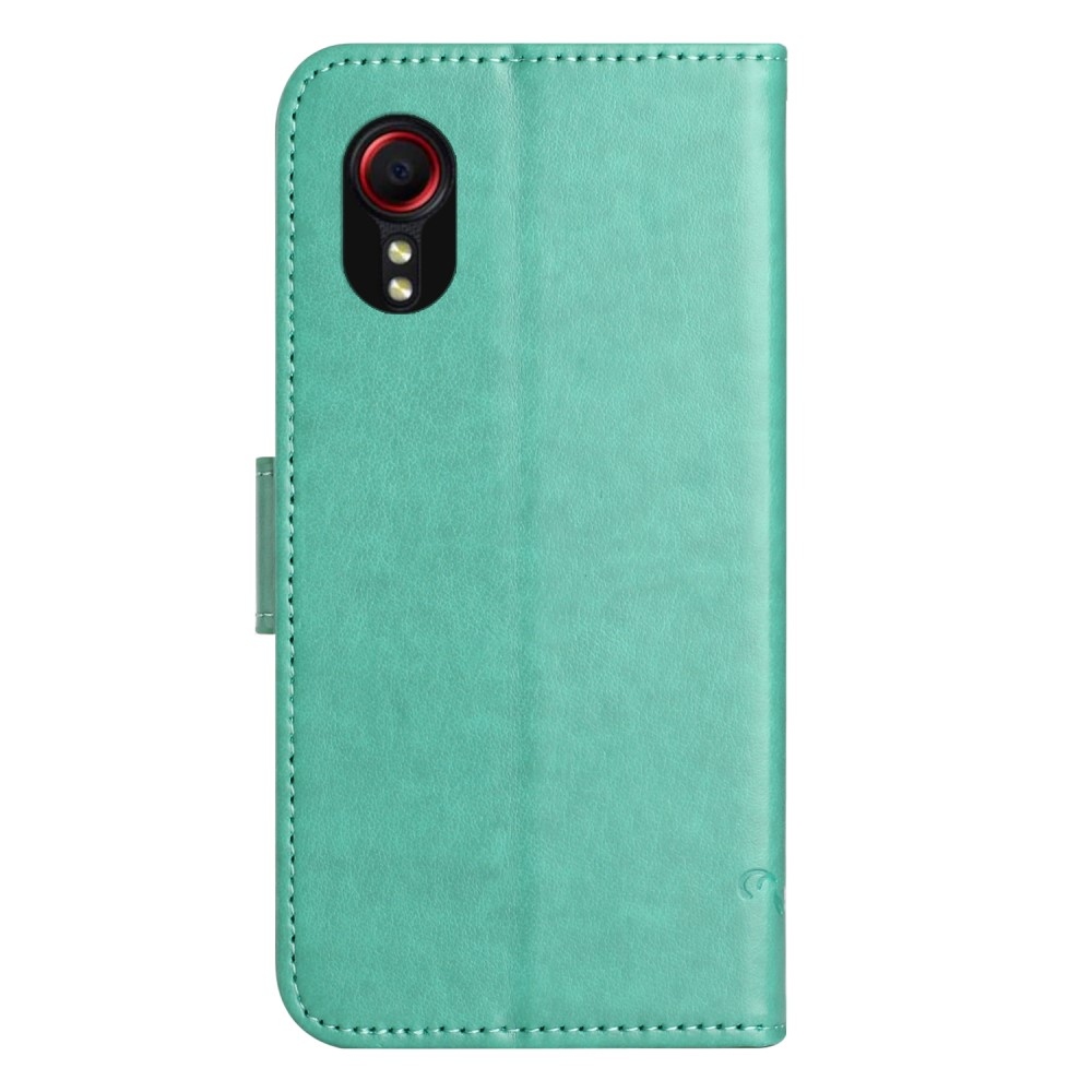 Virágos könyvtáska Samsung Galaxy Xcover 7 készülékhez - teal színű