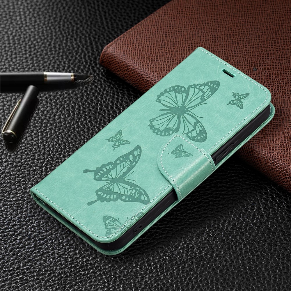 Pillangó könyvtáska iPhone 16-hoz - teáskék színű