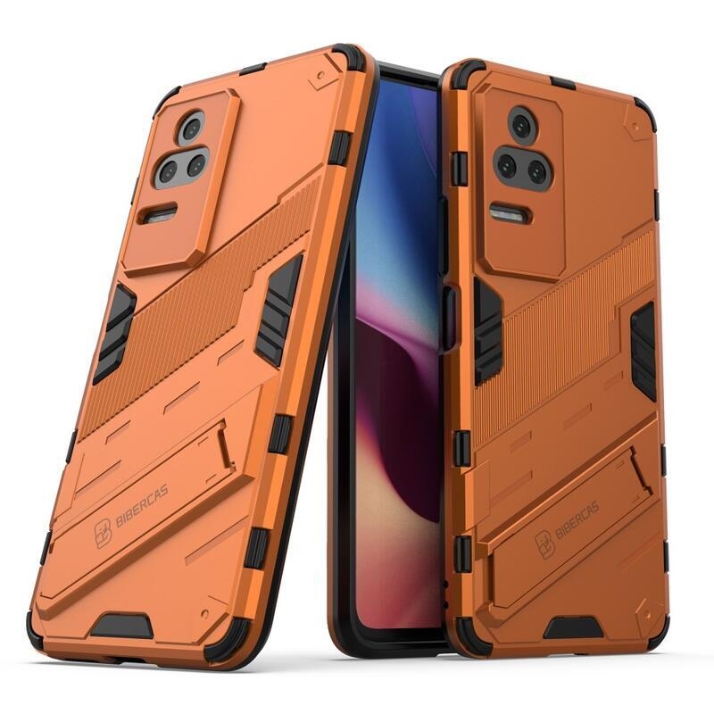 Héjálló hibrid borítás csuklós állvánnyal a Xiaomi Poco F4 5G-hez - narancssárga színű